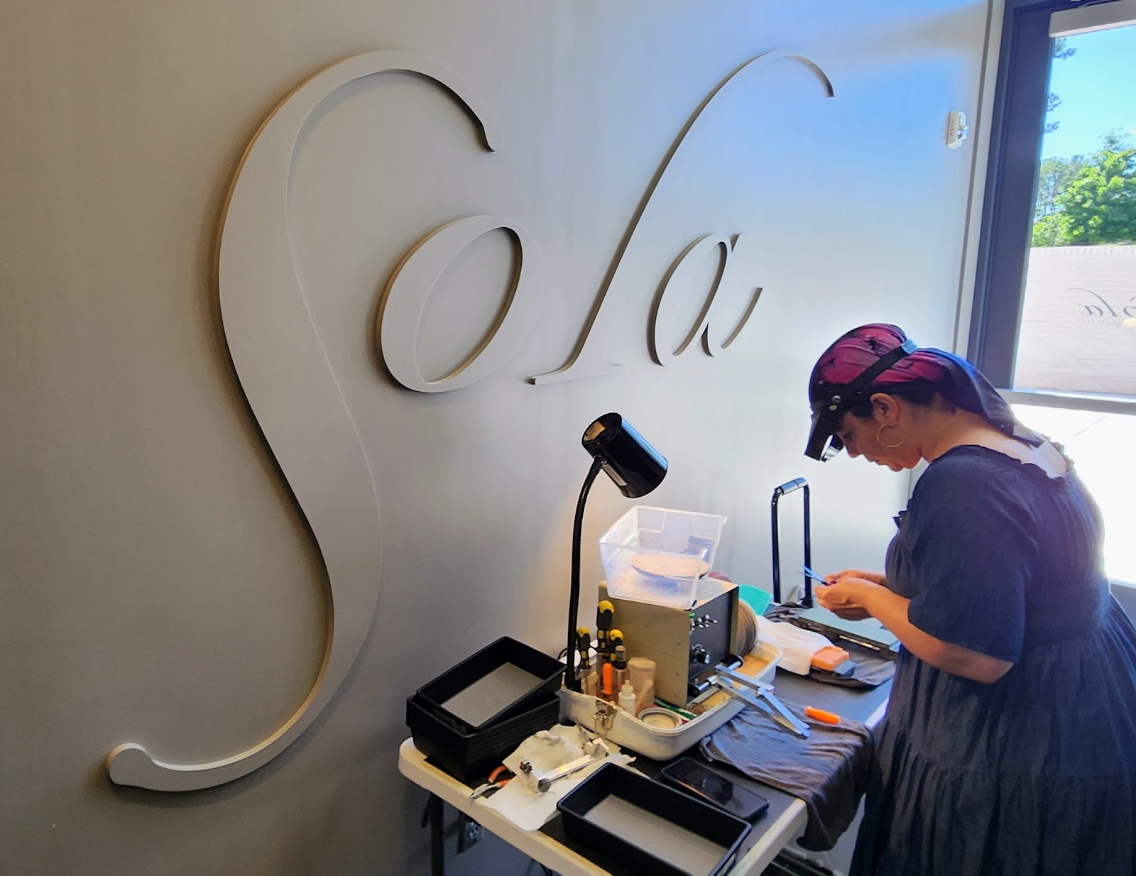 Sola Salons logo